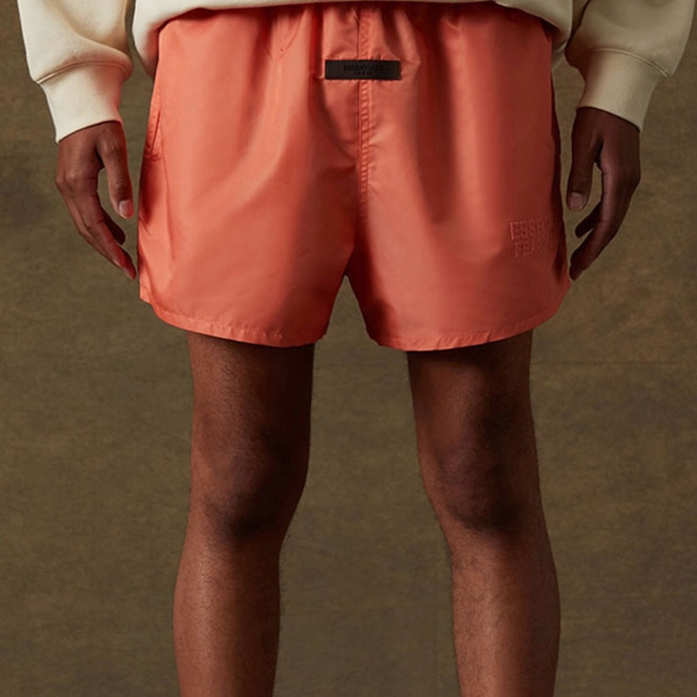 Fear of God Essentials coral nylon running shorts size S